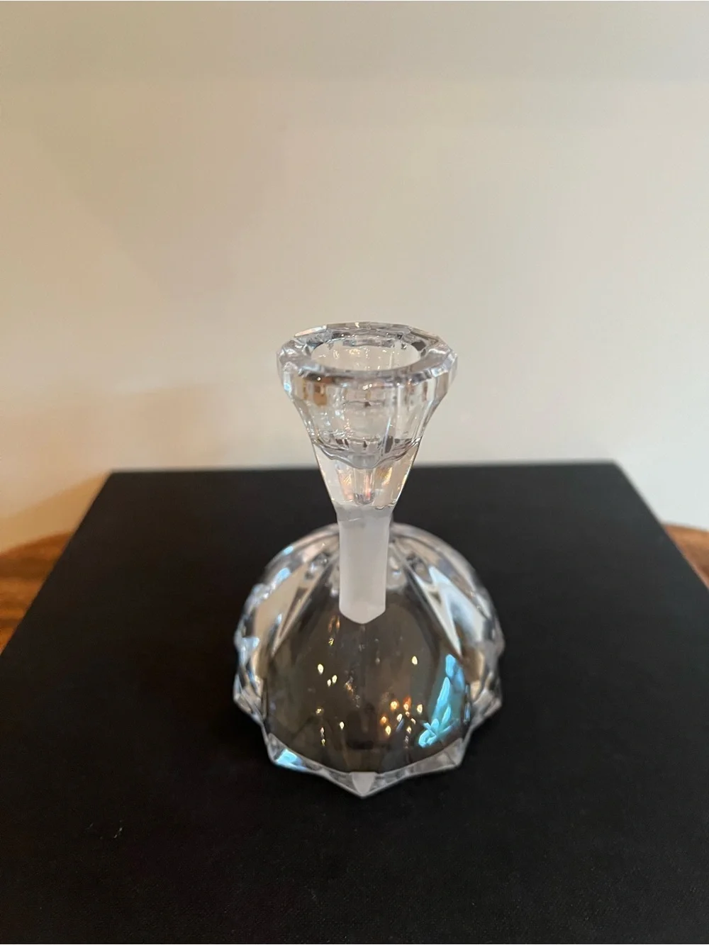 Glass candle holder Features a unique asymmetrical 